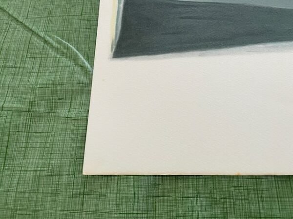 Lower left corner of Picasso lithograph showing aged edge and color fade