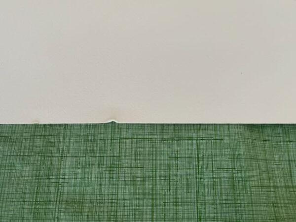 Mid-bottom edge with visible dent on Picasso lithograph